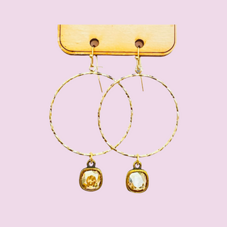 Textured metal tone circle earring with Austrian crystal