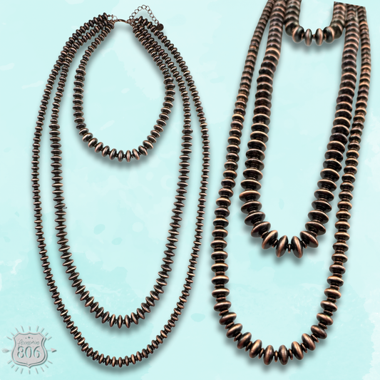 Triple strand burnished copper bead necklace