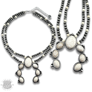 Western squash naja pendant necklace