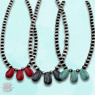 Three stone teardrop necklace