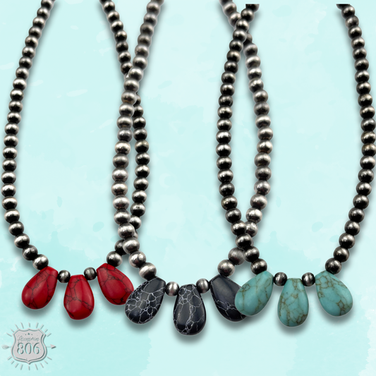 Three stone teardrop necklace