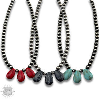 Three stone teardrop necklace