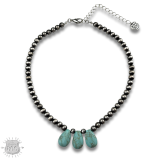 Three stone teardrop necklace