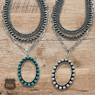 Burnished silver necklace, oval stone pendant