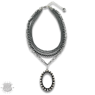 Burnished silver necklace, oval stone pendant