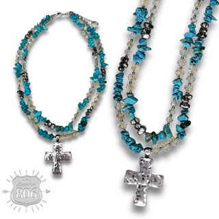 Textured cross pendant on chip stone double strand necklace