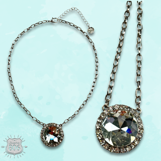 Large round pendant on silver link chain necklace