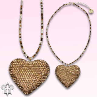 Rhinestone heart pendant on faceted glass bead necklace