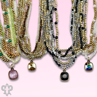 Gold tone and glass bead necklace with Austrian crystal