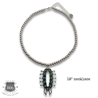 Squash blossom pendant necklace