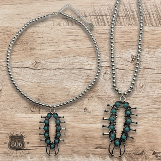 Squash blossom pendant necklace