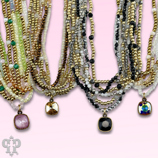 Gold tone and glass bead necklace with Austrian crystal