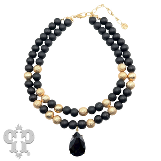 Wood and gold tone bead necklace with rhinestone teardrop charm - LC