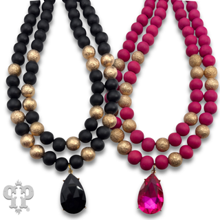 Wood and gold tone bead necklace with rhinestone teardrop charm - LC