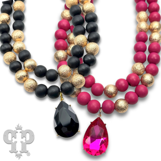 Wood and gold tone bead necklace with rhinestone teardrop charm - LC