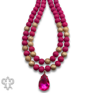 Wood and gold tone bead necklace with rhinestone teardrop charm - LC