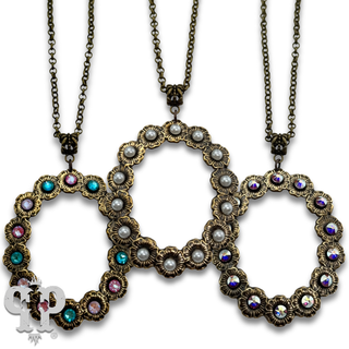 Open oval pendant necklace with rhinestone or pearl accents