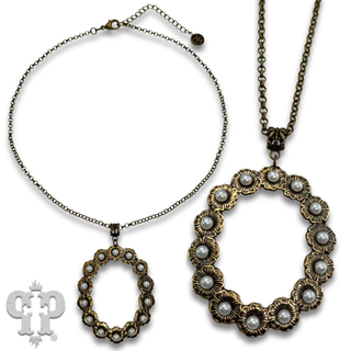 Open oval pendant necklace with rhinestone or pearl accents