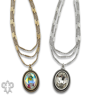Three strand chain necklace with oval rhinestone pendant