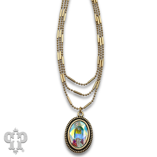 Three strand chain necklace with oval rhinestone pendant