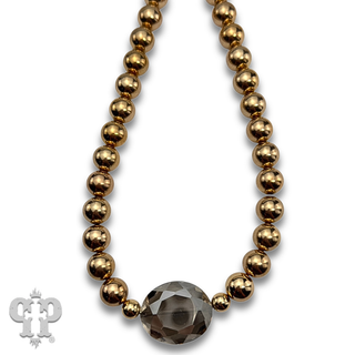 Gold bead and faceted glass bead feature necklace