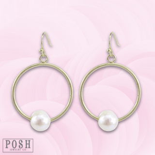 Gold circle earring with pearl charm