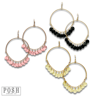 Disc charms on gold bar earring