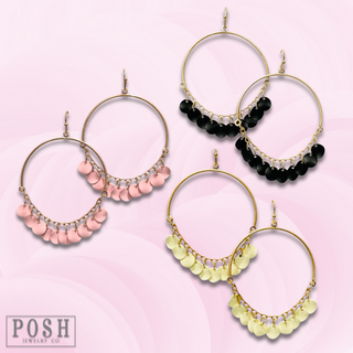 Disc charms on gold bar earring