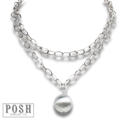 Double strand necklace with ball pendant