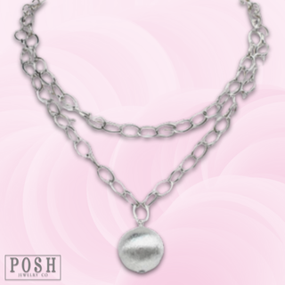 Double strand necklace with ball pendant
