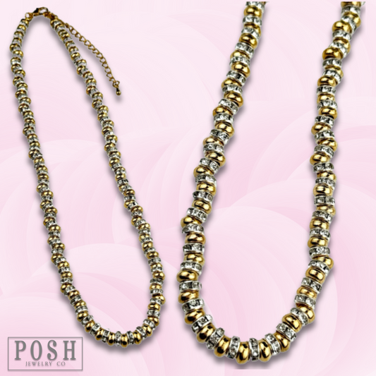 Gold saucer bead and clear rhinestone necklace