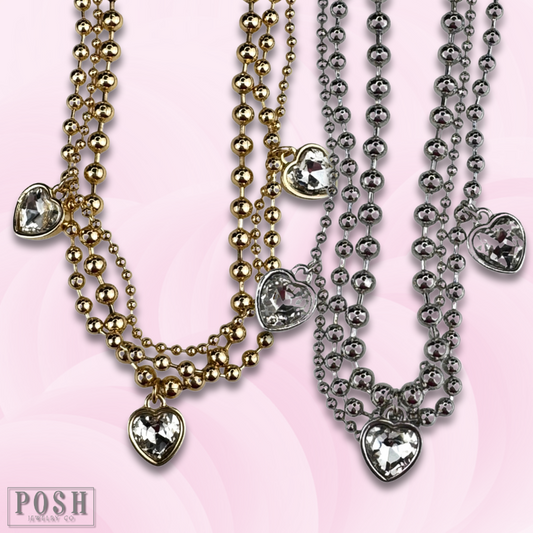 Three strand rhinestone heart charm necklace