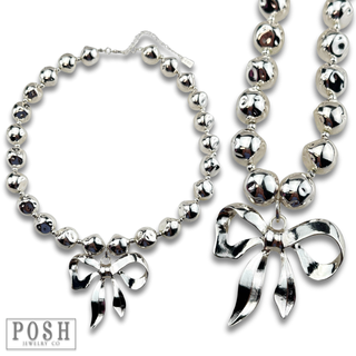 Large bow pendant necklace