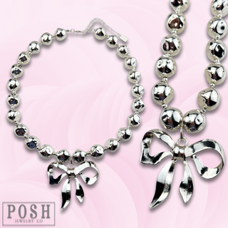 Large bow pendant necklace