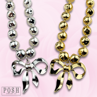 Large bow pendant necklace
