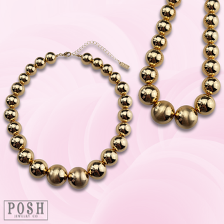 Gold round bead necklace