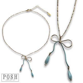 Whimsical bow pendant necklace