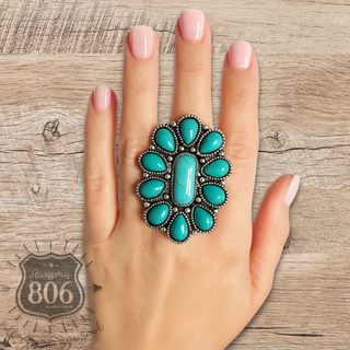 Turquoise color oval flower ring