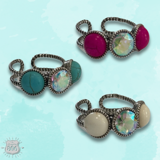 Round stone and iridescent ring