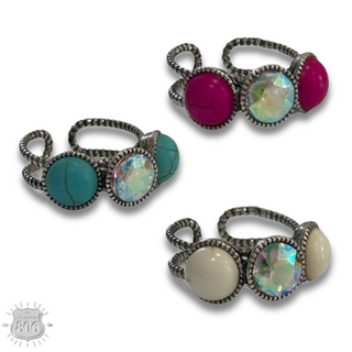 Round stone and iridescent ring