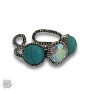 Round stone and iridescent ring